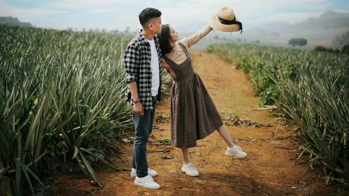 boy with his girlfriend in fields