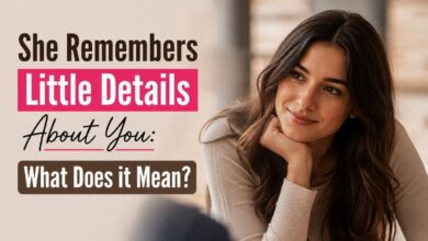 A smiling woman in a cream sweater looking thoughtfully toward someone, alongside text reading “She Remembers Little Details About You: What Does it Mean?”